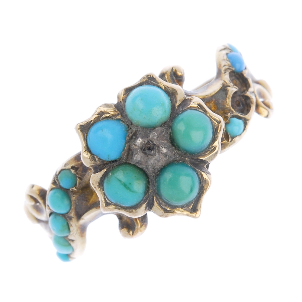 A mid Victorian 9ct gold turquoise and diamond forget-me-not ring. The circular turquoise cabochon