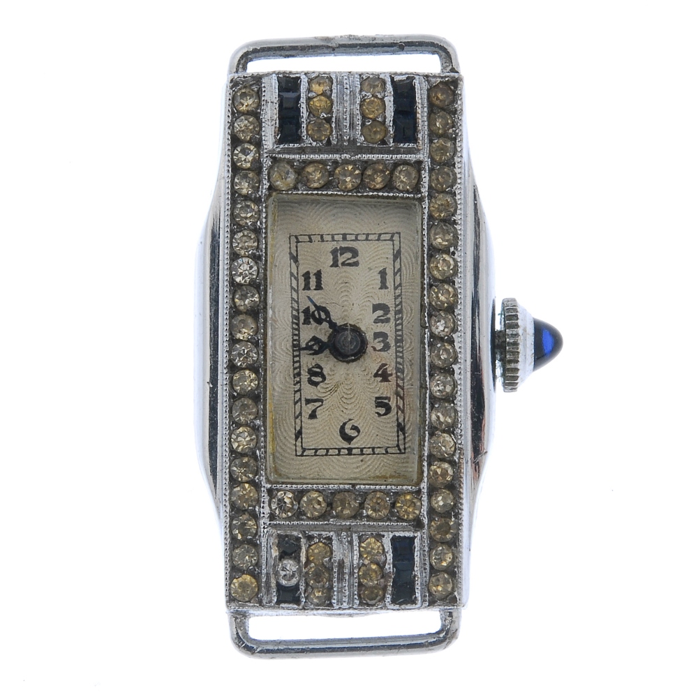 A lady's silver and paste watch head. Of rectangular outline, the blue and colourless pastes to