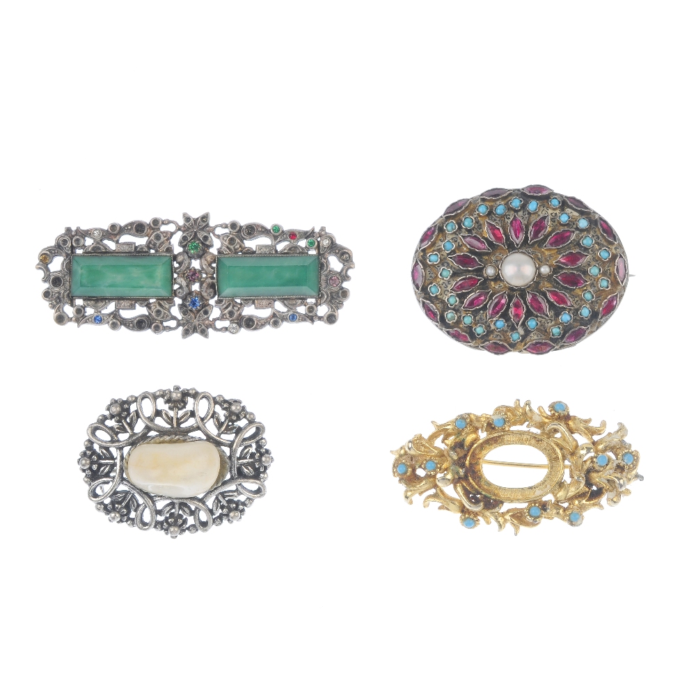 A selection of five items of costume jewellery. To include a late 19th century multi-gem brooch, a