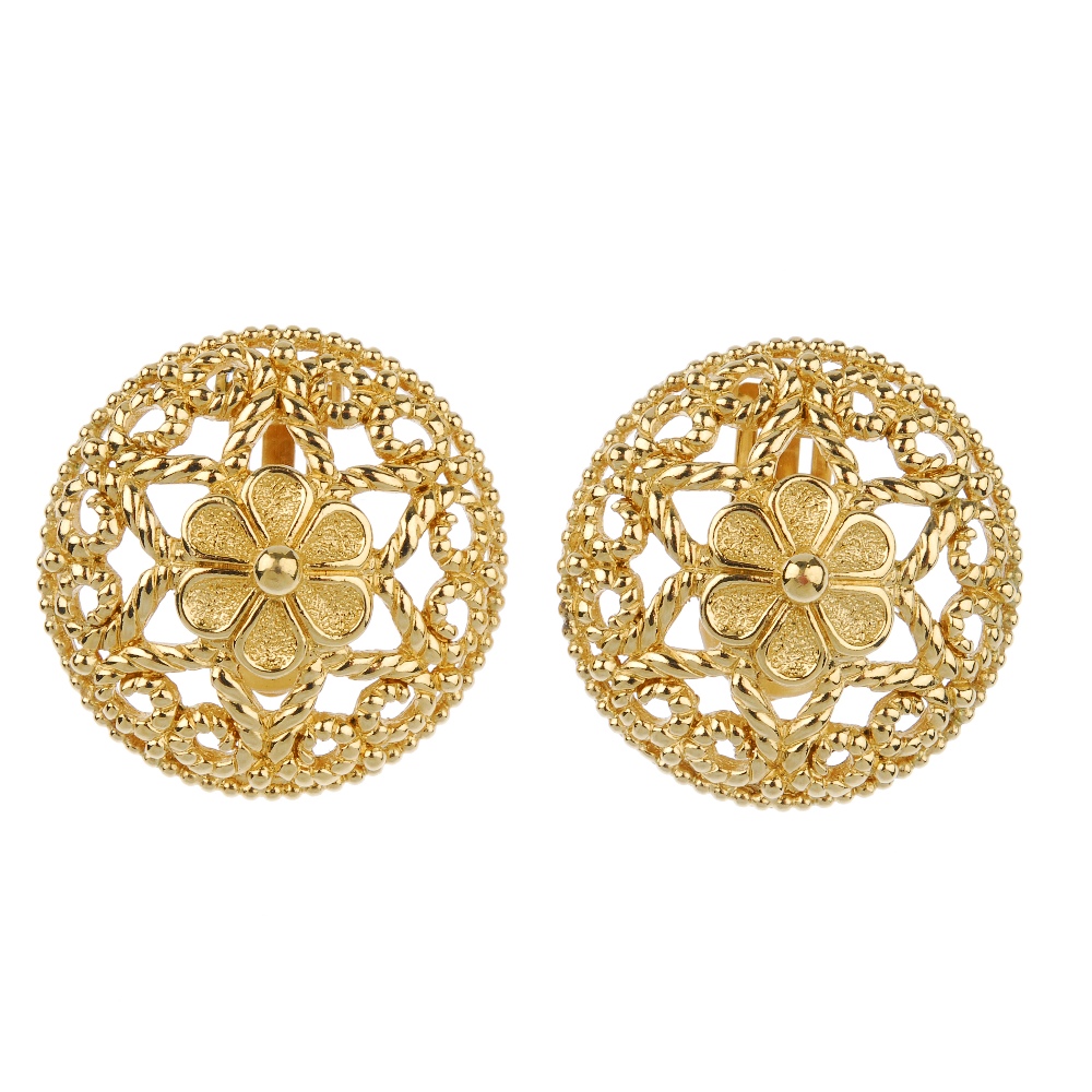 CHRISTIAN DIOR - two pairs of ear-clips. The first designed as a pair of circular-shape openwork