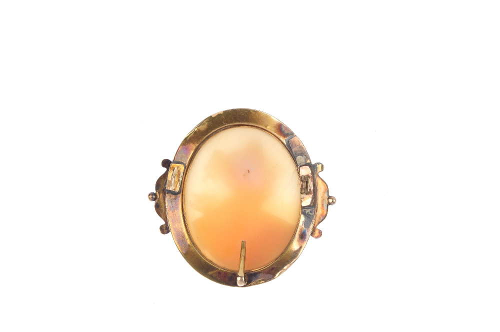 A mid 19th century mounted shell 18ct gold cameo. The oval-shape shell cameo, depicting Flora, to - Image 2 of 2