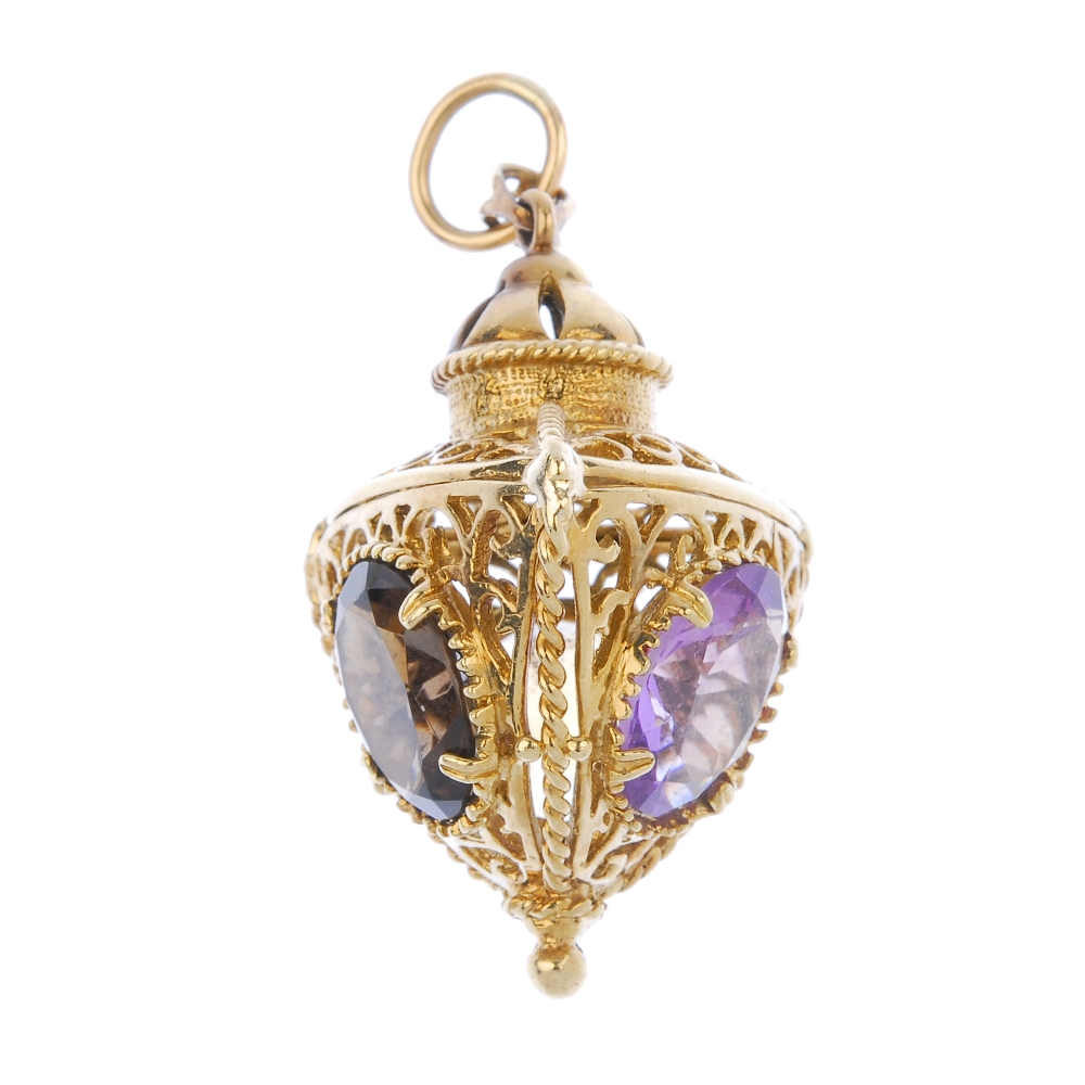 A 9ct gold gem-set fob. Designed as a lantern, set with oval-shape amethyst, smokey quartz and
