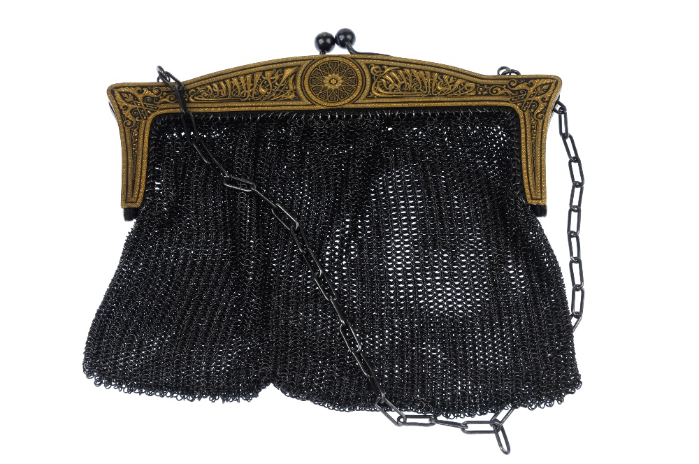 An early 20th century mesh bag. The dragon and foliate decorative frame with watch head detail, to - Image 5 of 5