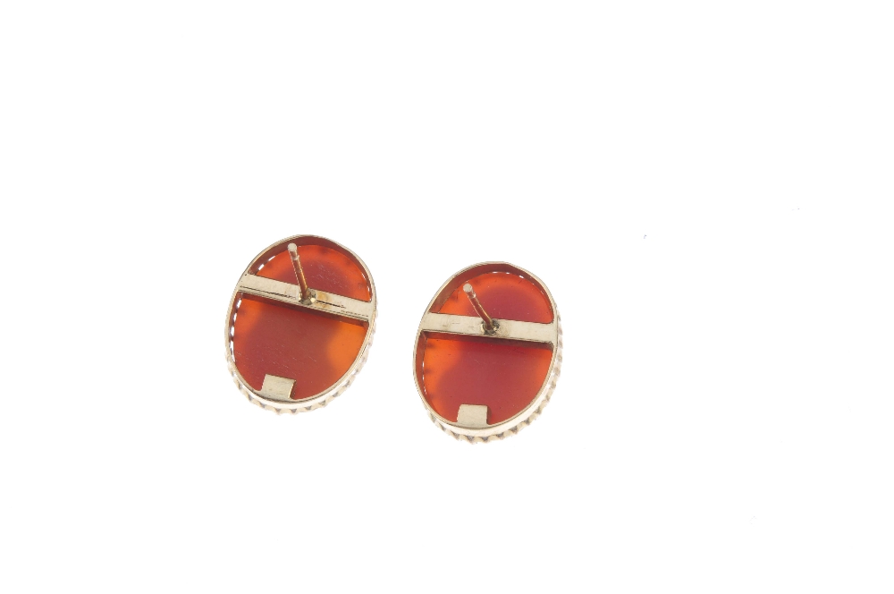 A pair of hardstone cameo ear studs. Each designed as a hardstone cameo carved to depict the side - Image 2 of 3