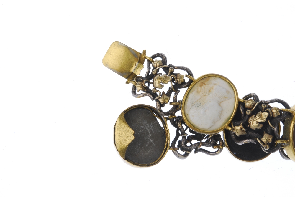 A lava cameo bracelet. Comprising four oval-shape lava cameo panels, of varying tones depicting - Image 3 of 3