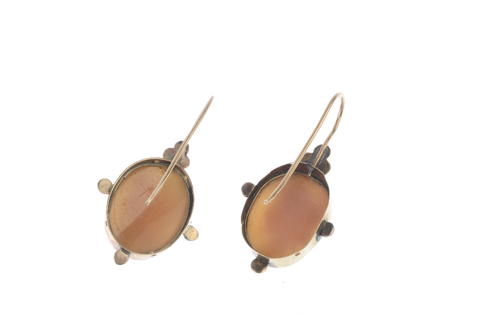 A pair of early 20th century 9ct gold shell cameo ear pendants. Each designed as an oval-shape shell - Image 2 of 2