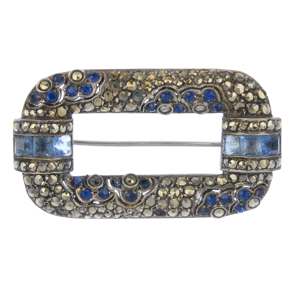 An early 20th century silver marcasite and paste brooch. The rectangular-shape marcasite brooch,