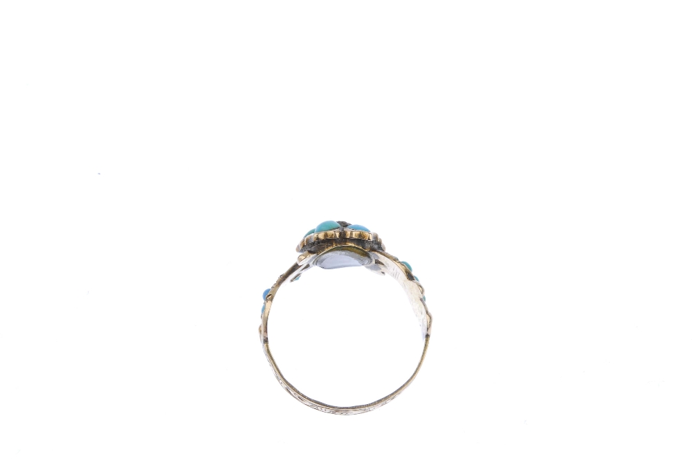 A mid Victorian 9ct gold turquoise and diamond forget-me-not ring. The circular turquoise cabochon - Image 4 of 4