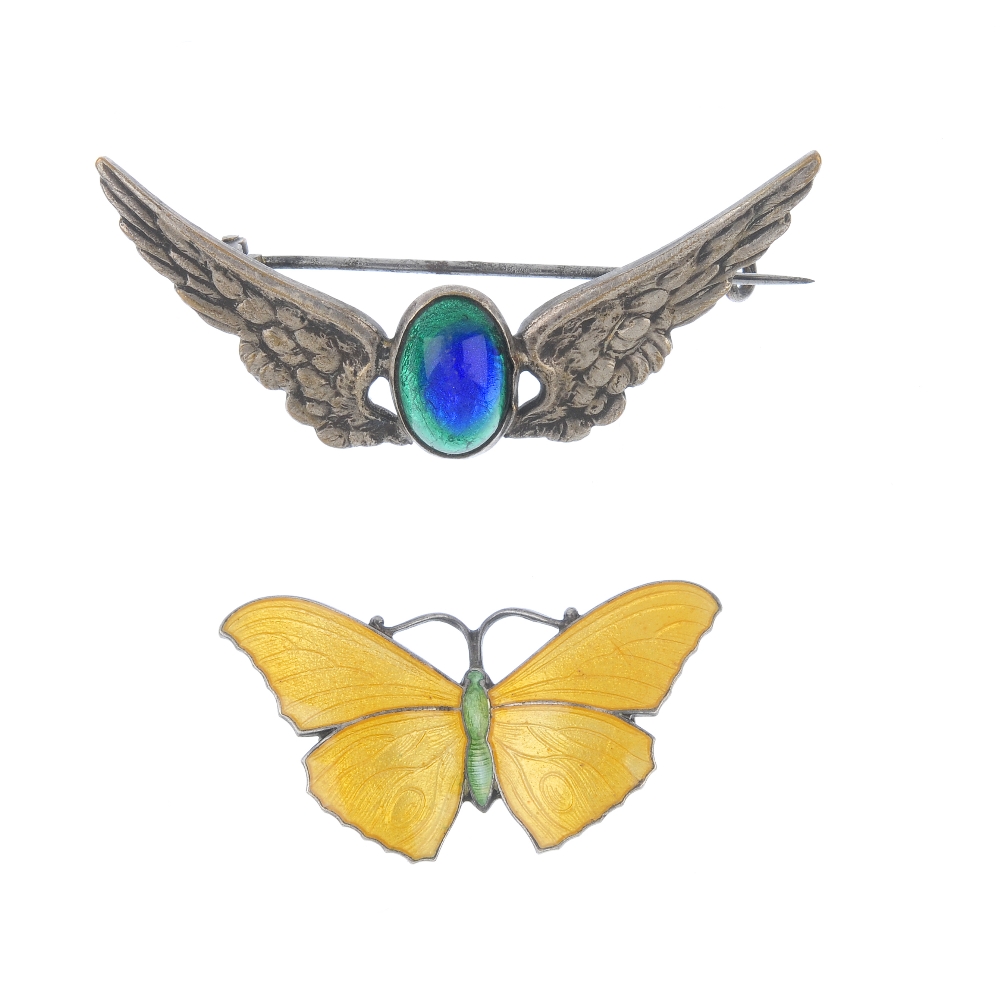 Two early 20th century silver and enamel brooches. One by J. Aitken & Son, in the form of a