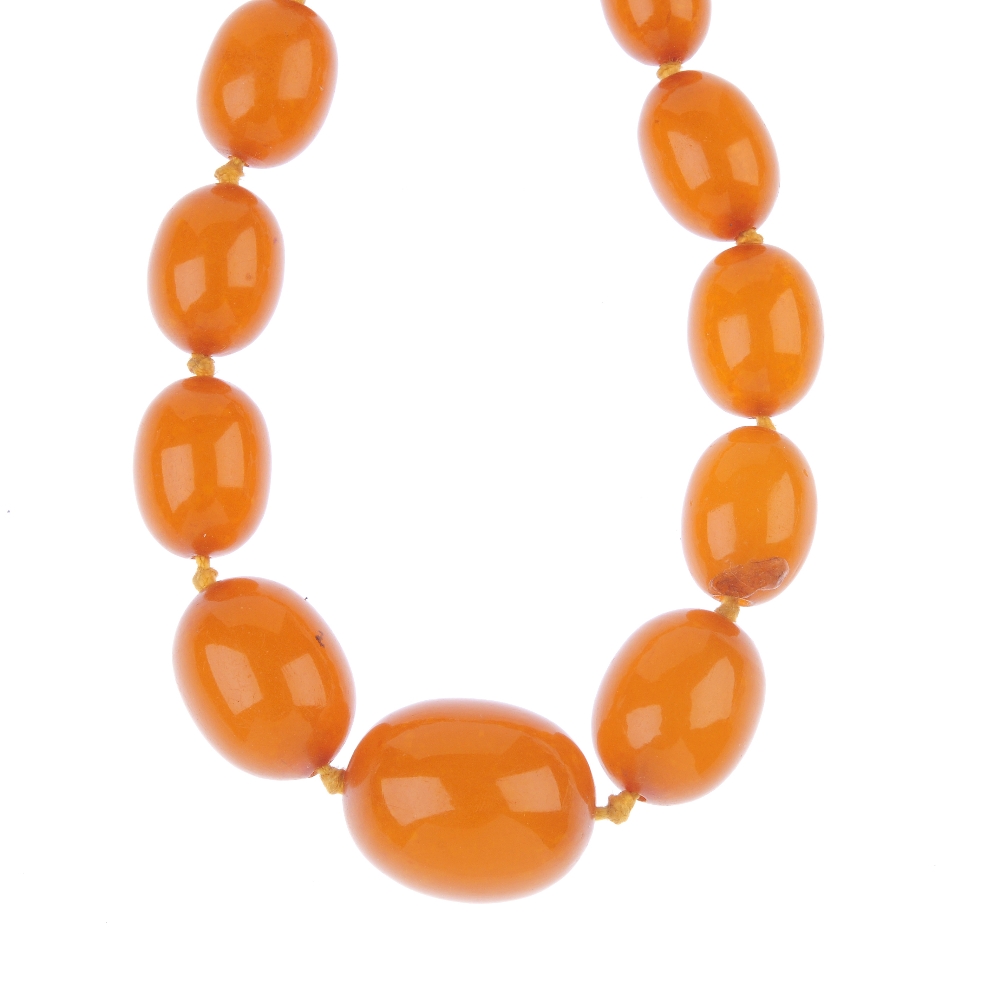 An early 20th reconstructed amber bead necklace. Comprising a single row of graduated beads