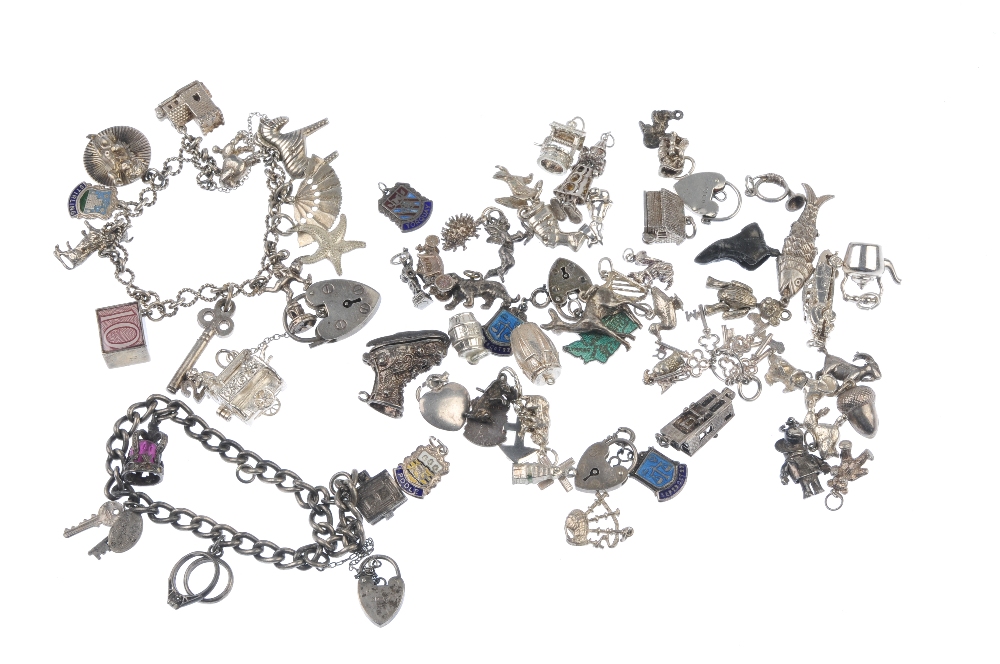 Three charm bracelets and some loose charms. Suspending twenty-two charms, to include a key, a - Image 2 of 2