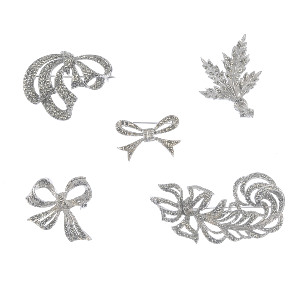 A selection of marcasite jewellery. Including a brooch designed as a feather with a bow to one