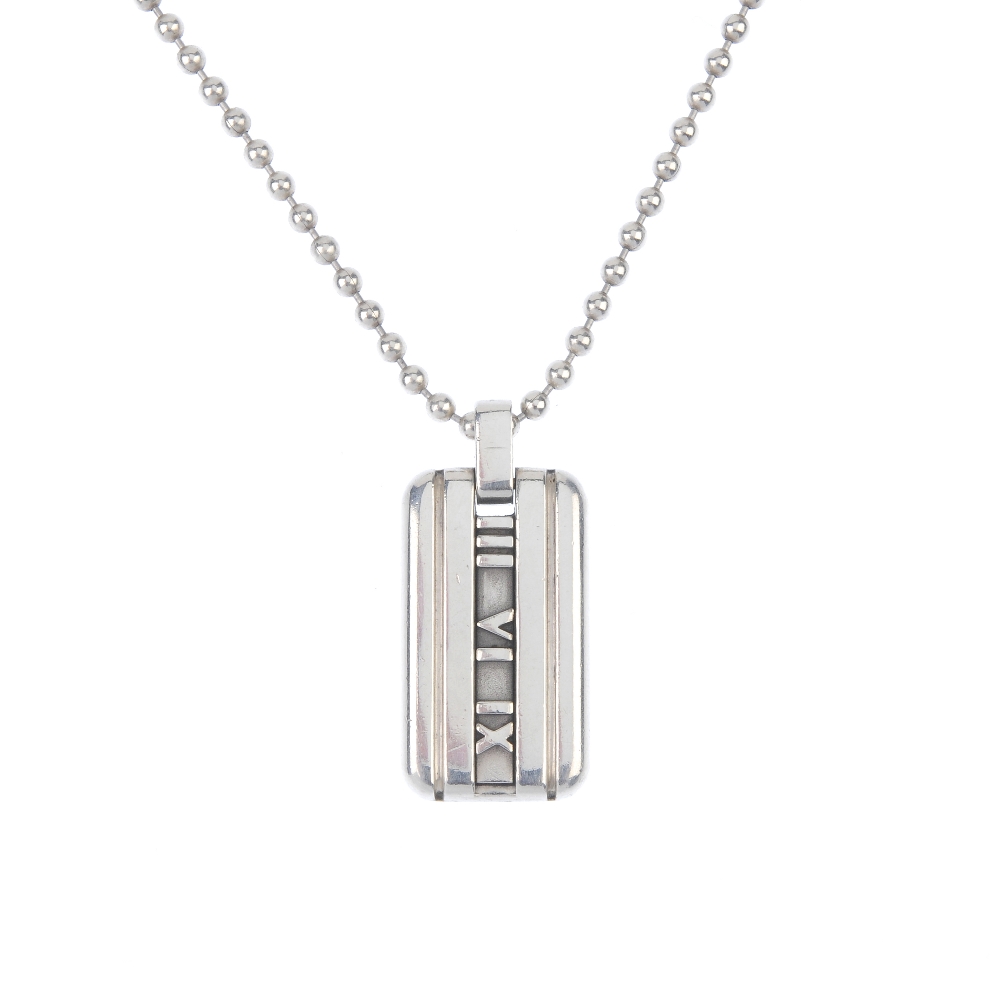 TIFFANY & CO. - a silver 'Atlas' pendant. Designed as a rectangular-shape tag, with signature