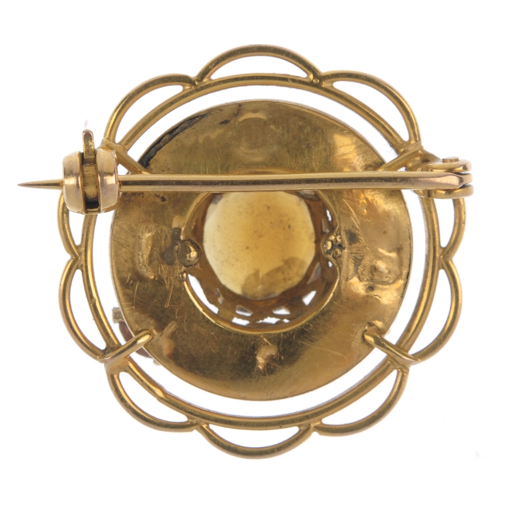 A citrine cluster brooch. The circular-shape citrine, within a similarly-cut citrine and engraved - Image 2 of 2