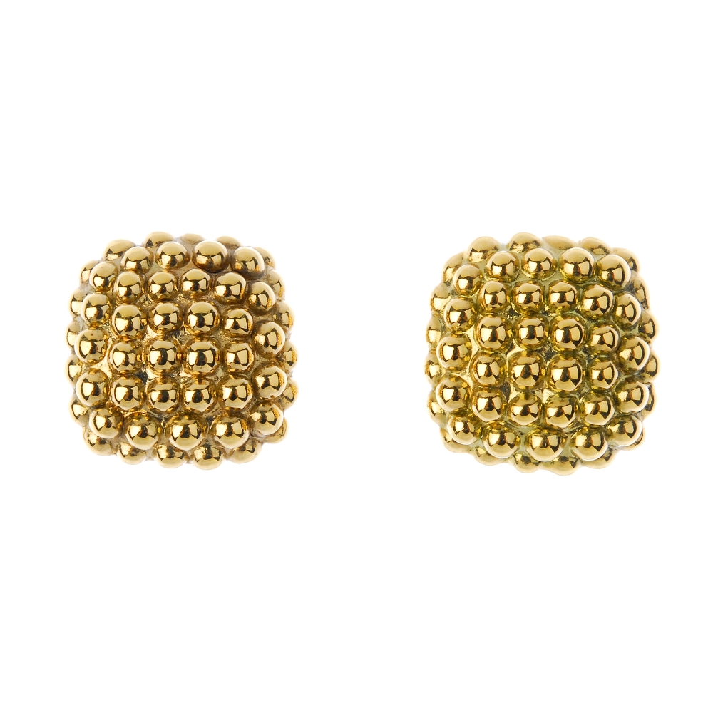 FOPE - a pair of 18ct gold ear studs. Each designed with textured beaded detail and clip back