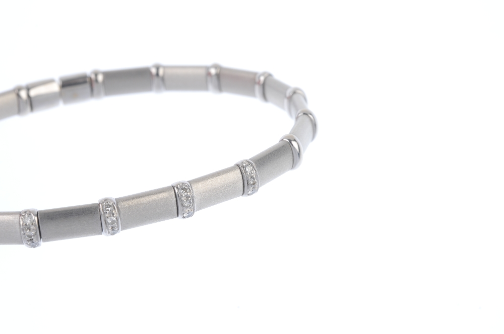 A diamond cuff. Designed as a series of rectangular textured panels, with polished bar spacers, to - Image 2 of 3