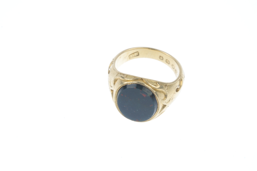 A gentleman's early 20th century 18ct gold bloodstone signet ring. The oval bloodstone panel, to the - Image 2 of 4