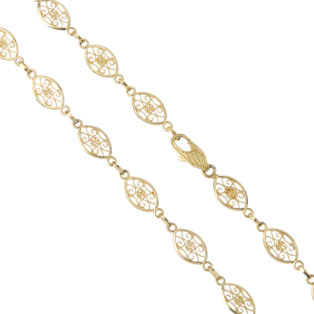 An 18ct gold necklace. Designed as a series of marquise-shape openwork links, to the textured