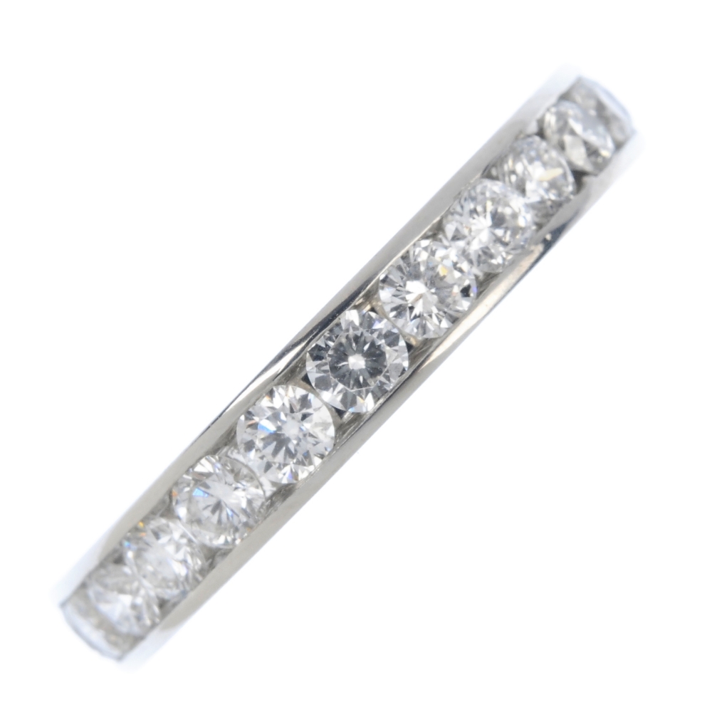 TIFFANY & CO. - a diamond full-circle eternity ring. The brilliant-cut diamond line, within a