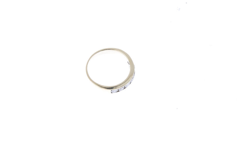A 9ct gold diamond half-circle eternity ring. The brilliant-cut diamond line, within a channel- - Image 3 of 4