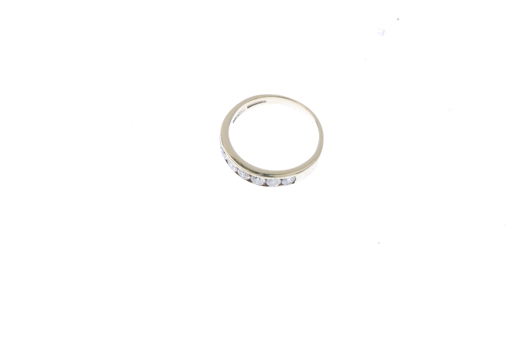 A 9ct gold diamond half-circle eternity ring. The brilliant-cut diamond line, within a channel- - Image 2 of 4