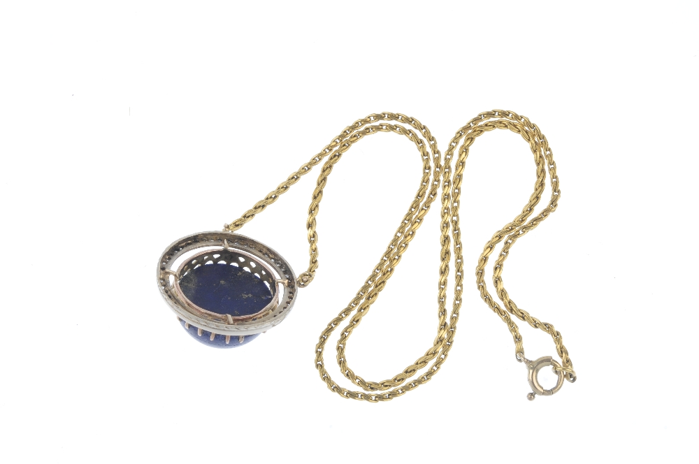 A lapis lazuli and diamond pendant. The circular lapis lazuli cabochon, within a rose-cut diamond - Image 2 of 2