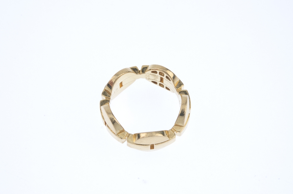 CARTIER - an 18ct gold diamond dress ring. Designed as a series of circular panels, with central bar - Image 4 of 4