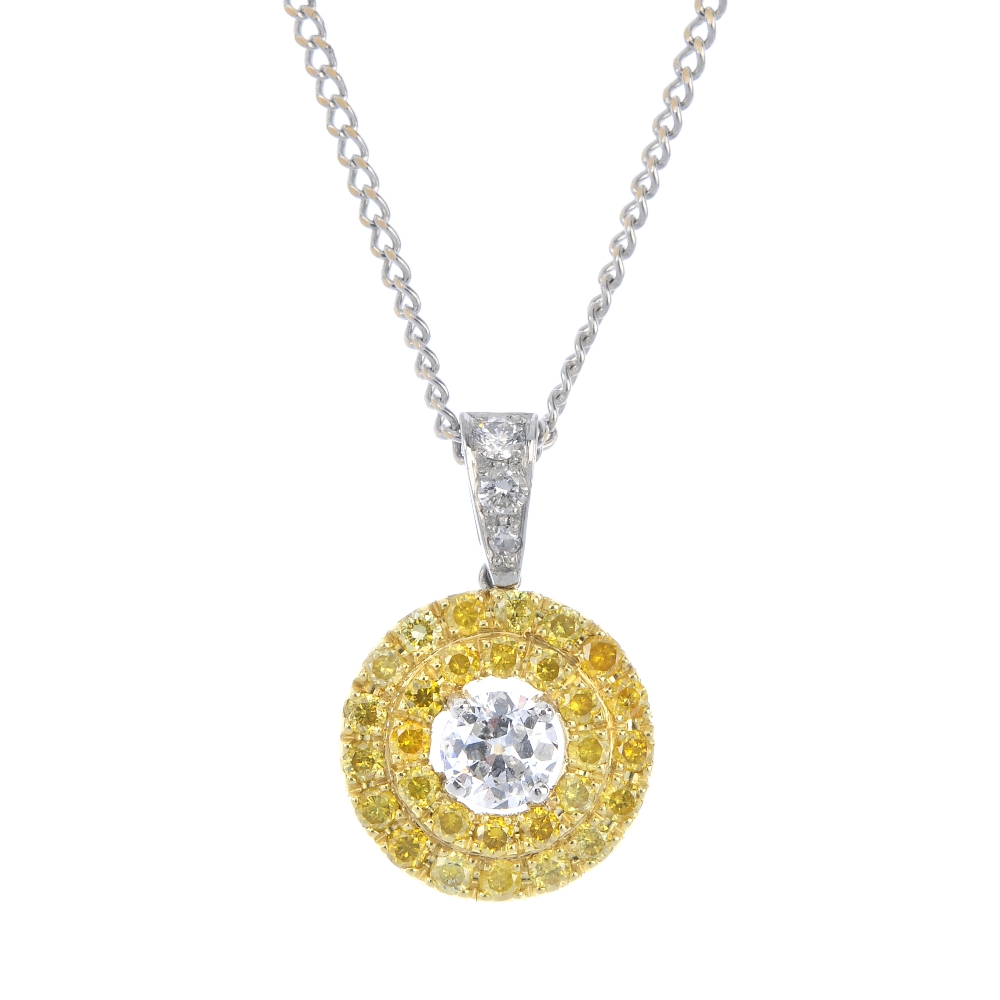 A coloured diamond and diamond pendant with chain. The old-cut diamond, within a similarly-cut '