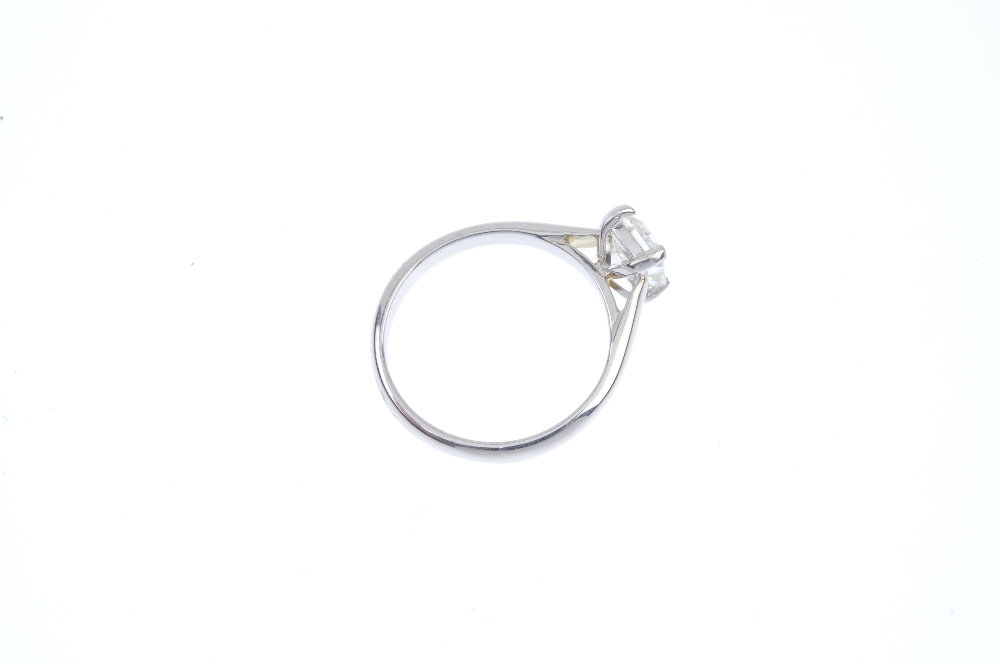 An 18ct gold diamond single-stone ring. The rectangular-shape diamond, to the plain band. - Image 4 of 4