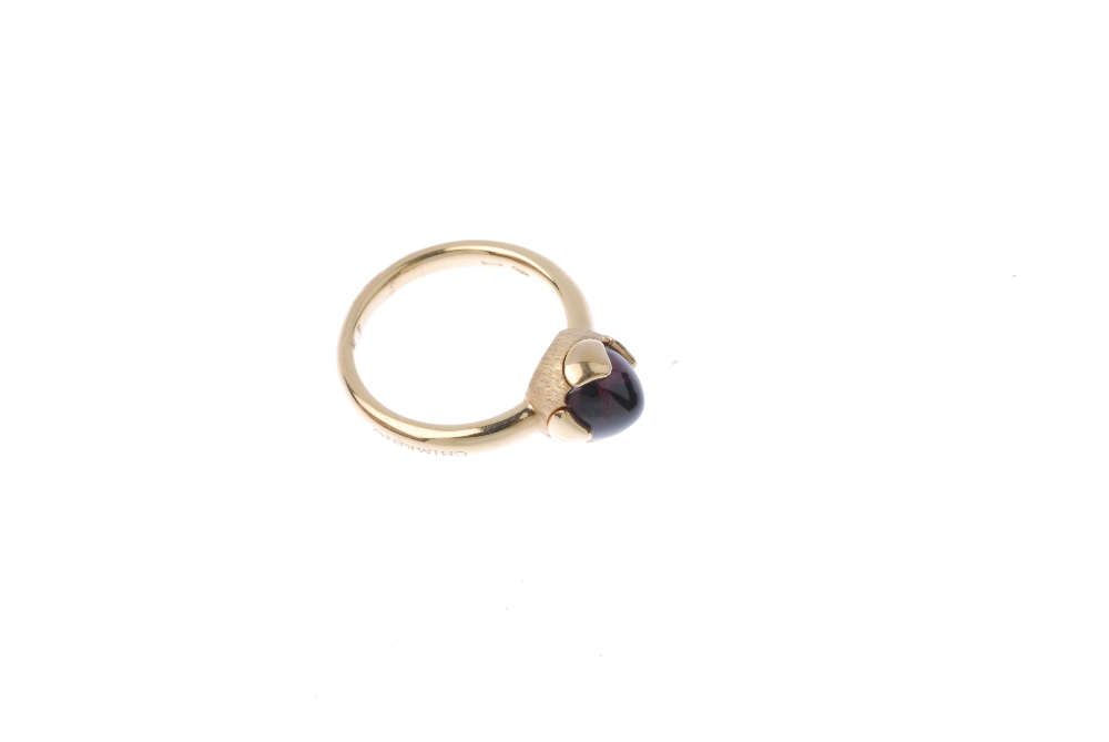 CHIMENTO - an 18ct gold garnet single-stone ring. The garnet cabochon, within a vari-texture petal - Image 3 of 4