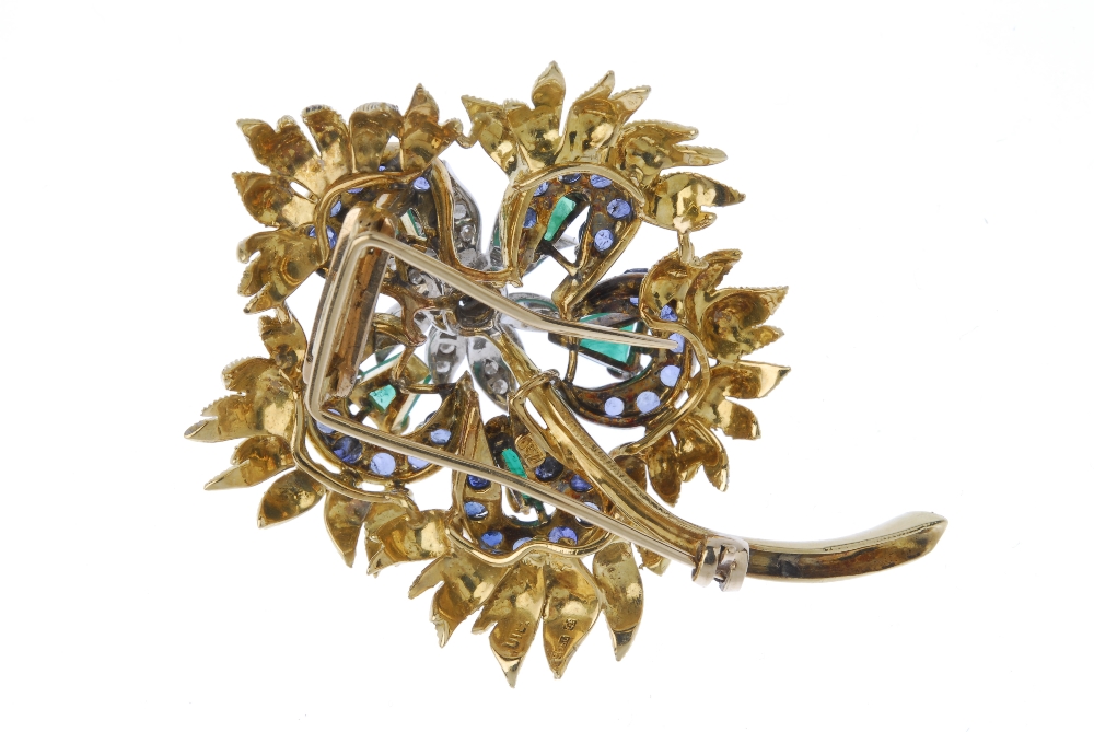 A mid 20th century diamond, emerald and sapphire spray brooch. The square-shape emerald and single- - Image 2 of 2
