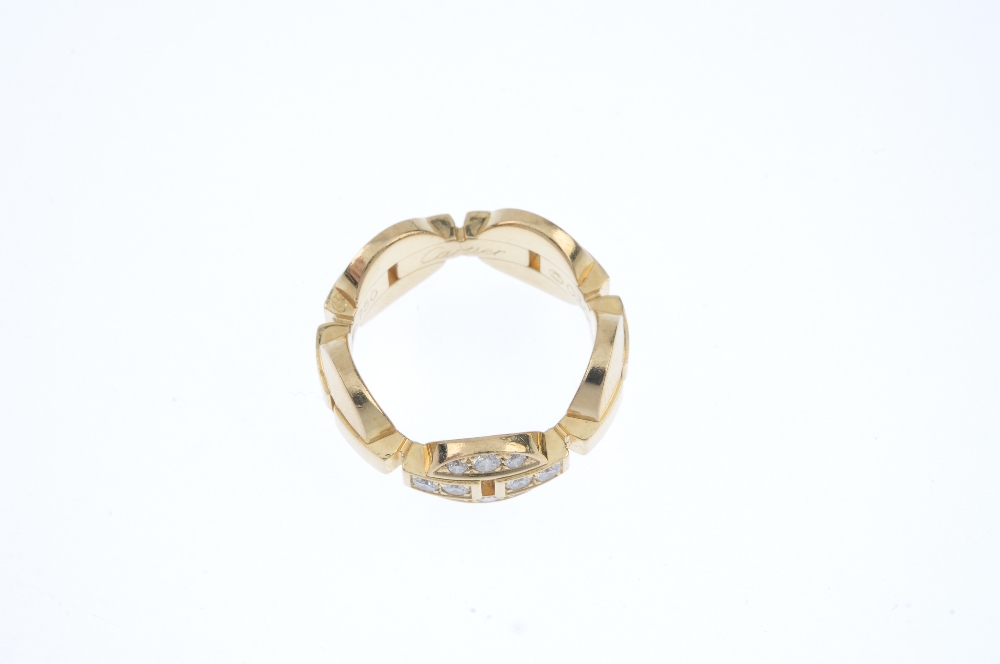 CARTIER - an 18ct gold diamond dress ring. Designed as a series of circular panels, with central bar - Image 2 of 4