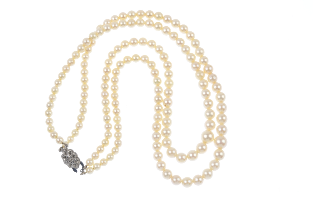 A cultured pearl two-row necklace. Comprising two-rows of seventy-two and seventy-seven graduated - Image 2 of 2