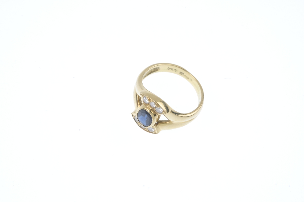 A sapphire and diamond dress ring. The oval-shape sapphire collet, to the brilliant-cut diamond - Image 2 of 4