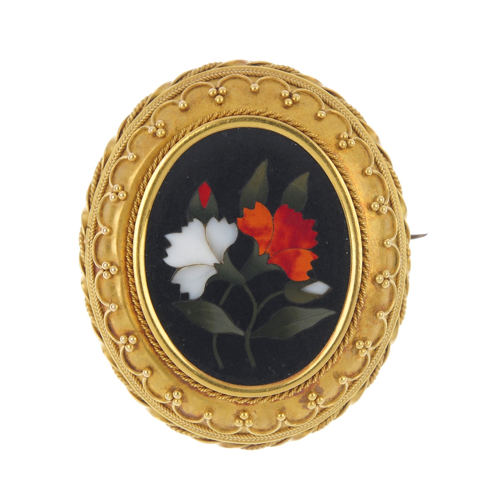 A late 19th century gold pietra dura brooch. Of foliate design, the pietra dura panel, within a