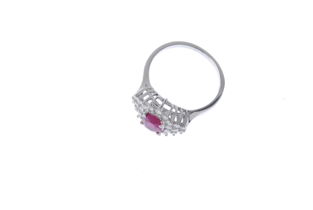 An 18ct gold glass-filled ruby and diamond dress ring.  Of marquise- shape outline, The oval-shape - Image 2 of 4