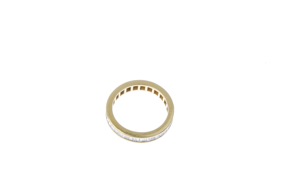 An 18ct gold diamond full-circle eternity ring. The rectangular-shape diamonds, within a chanel- - Image 3 of 3