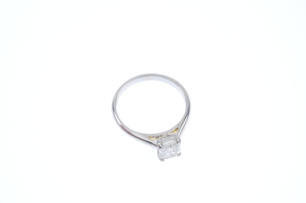 An 18ct gold diamond single-stone ring. The rectangular-shape diamond, to the plain band. - Image 2 of 4