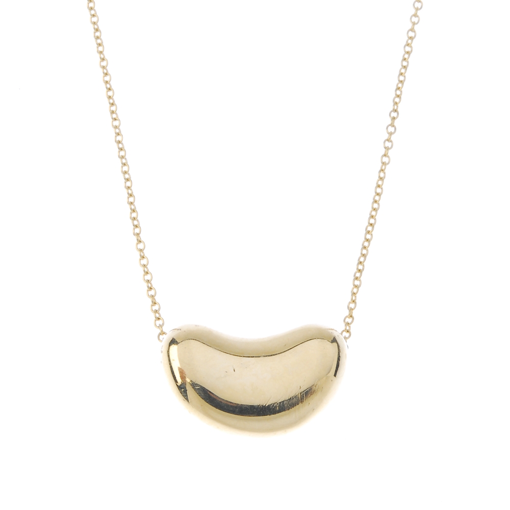 TIFFANY & CO. - a 'Bean' pendant, by Elsa Peretti for Tiffany & Co. The trace-link chain