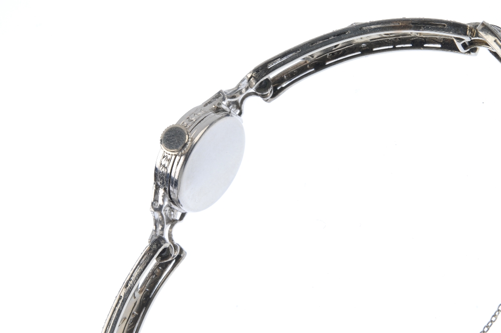 An early 20th century platinum diamond cocktail watch. The circular-shape cream dial, with black - Image 2 of 3