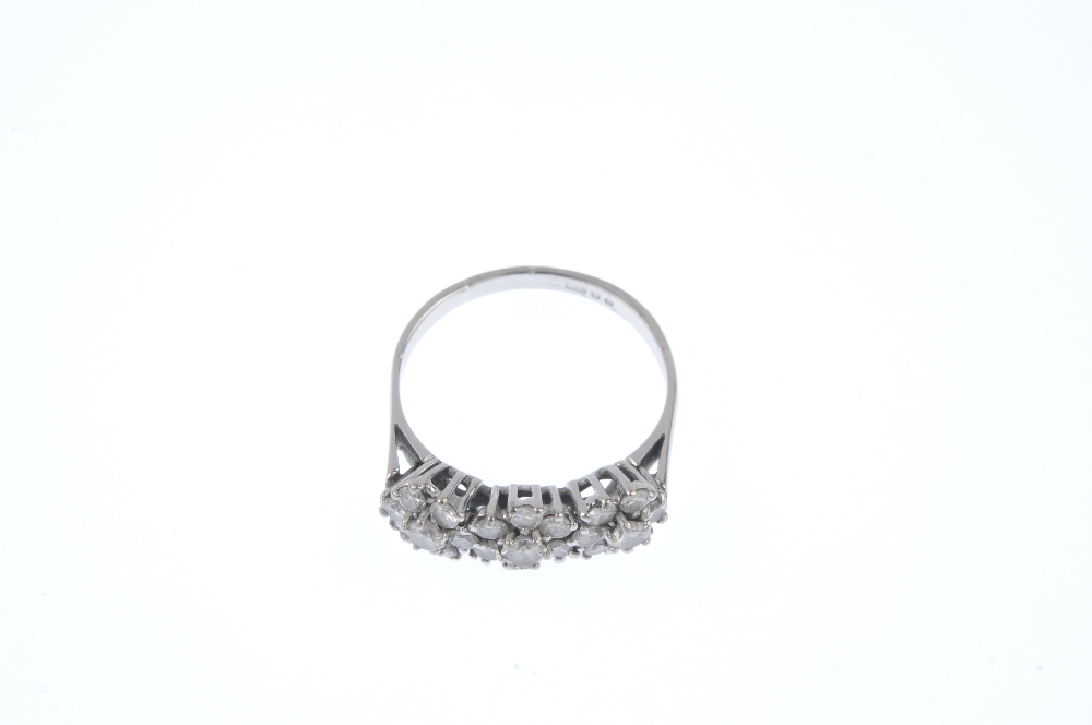 An 18ct gold diamond floral dress ring. The brilliant-cut diamond floral cluster, with similarly-cut - Image 2 of 4