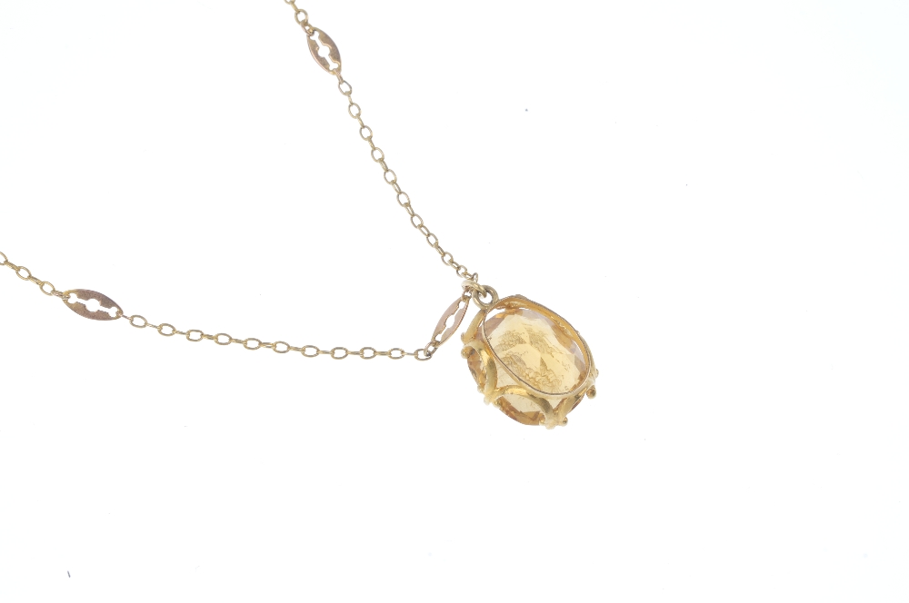 A citrine intaglio pendant. The oval-shape citrine intaglio depicting the profile of a gentleman, - Image 2 of 3