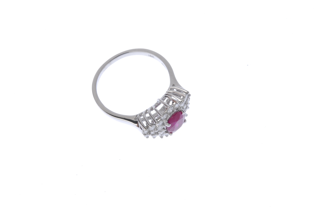 An 18ct gold glass-filled ruby and diamond dress ring.  Of marquise- shape outline, The oval-shape - Image 3 of 4