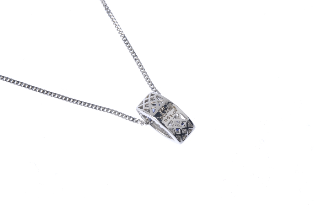 An 18ct gold sapphire and diamond pendant. Designed as a tapered hoop, the two square shape sapphire - Image 2 of 3