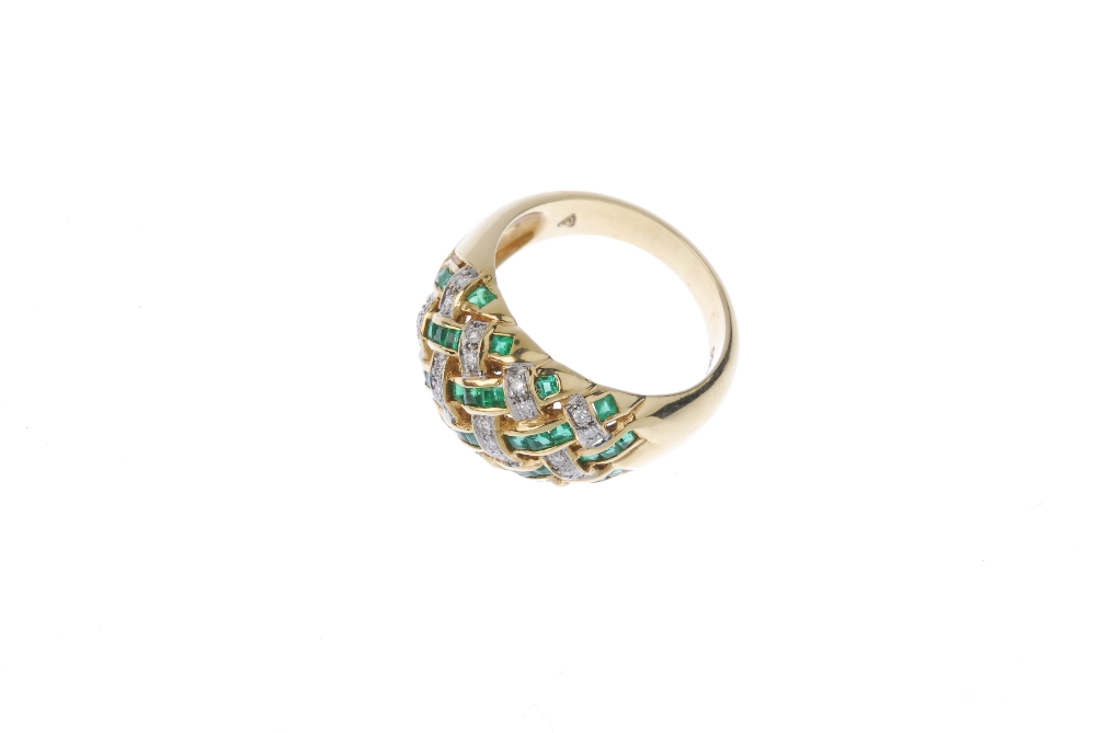 A diamond and emerald dress ring. Of openwork design, the square-shape emerald and brilliant-cut - Image 2 of 4