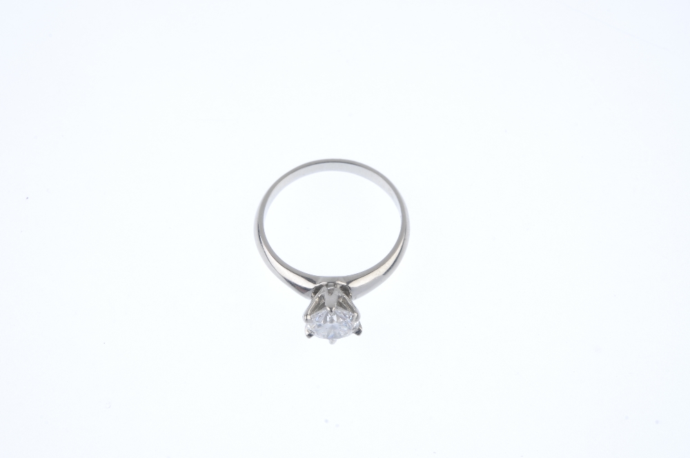 A diamond single-stone ring. The brilliant-cut diamond, weighing 0.70ct, to the tapered band. - Image 2 of 5