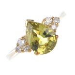 A 9ct gold chrysoberyl and diamond ring. The pear-shape chrysoberyl, with brilliant-cut diamond