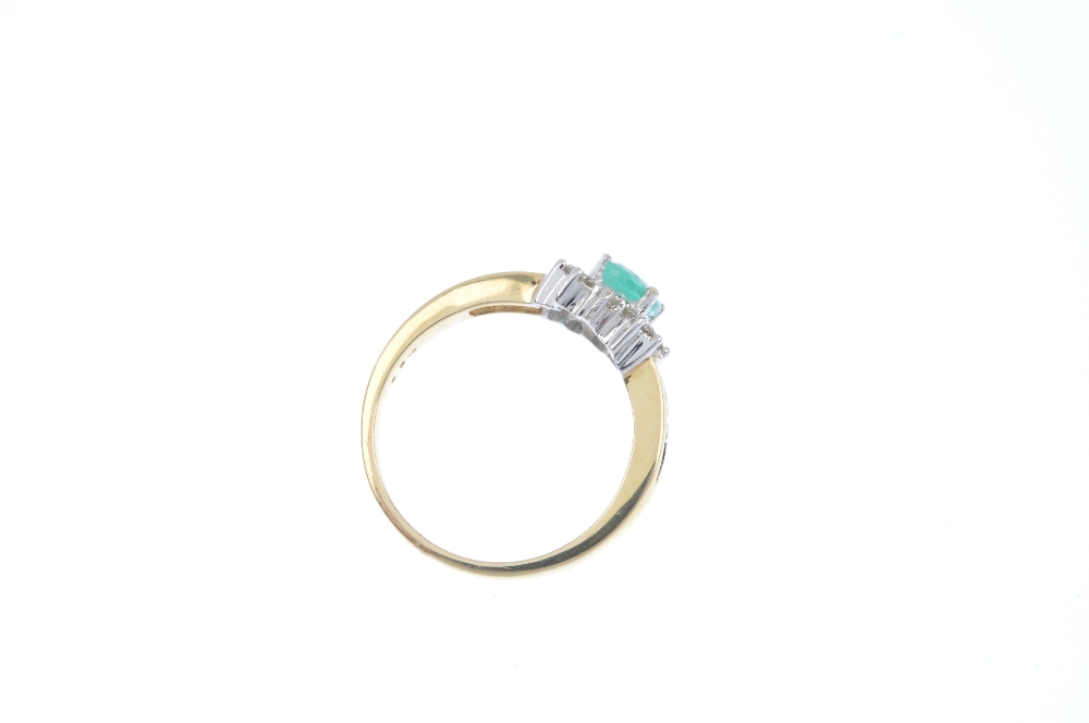 * An 18ct gold emerald and diamond cluster ring. The oval-shape emerald, within a brilliant-cut - Image 4 of 4