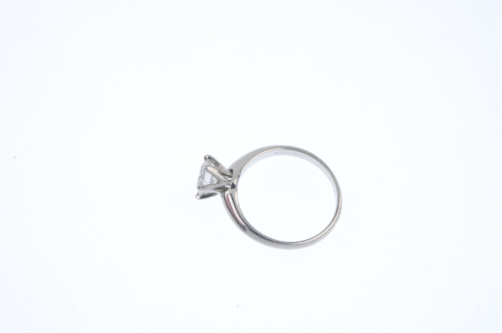 A diamond single-stone ring. The brilliant-cut diamond, weighing 0.70ct, to the tapered band. - Image 3 of 5