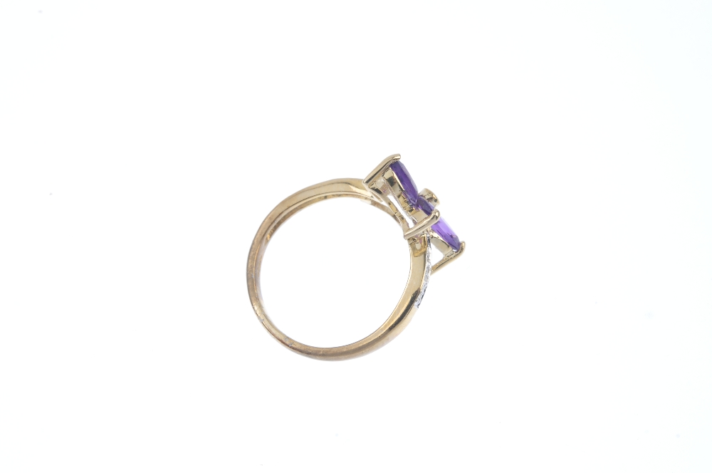 A 9ct gold amethyst and diamond floral ring. The marquise-shape amethyst flower, to the single-cut - Image 4 of 4